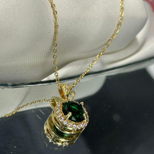 Gold Necklace with Oval Emerald